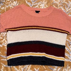 It’s a cropped sweater